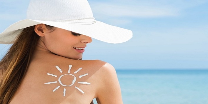 Sun Drawn On Woman's Shoulder Suntan Lotion